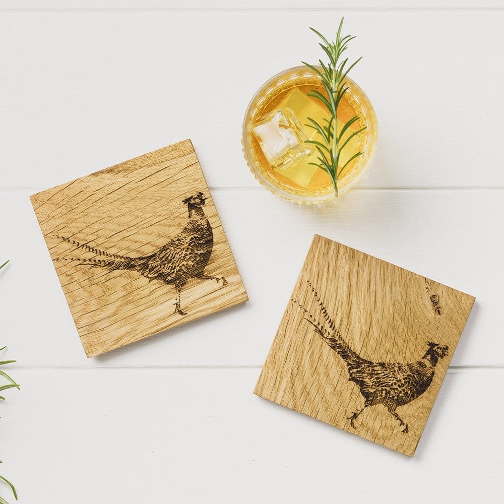 In this photo 2 Oak Coasters Pheasant Mood4Whisky
