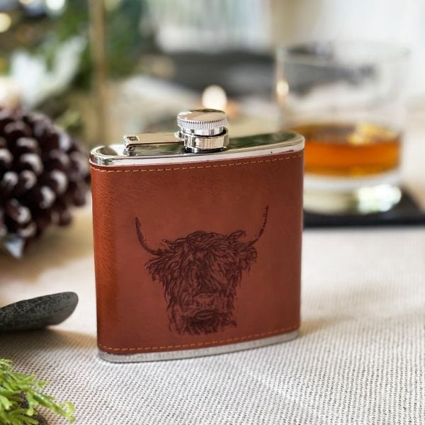 In this photo Hip Flask Highland Cow - Leather - Selbraehouse Scotland Mood4Whisky