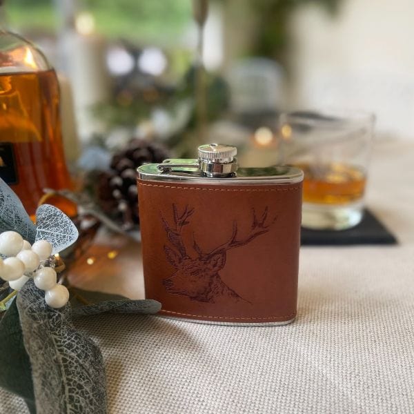 In this photo Hip Flask Stag - Leather - Selbraehouse Scotland Mood4Whisky